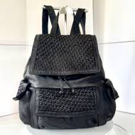 Ronald Rucksack aus gewaschenem Leder in Schwarz mit geflochtenen Klappen