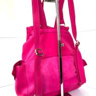 Ronald Rucksack aus gewaschenem Leder in Fuchsia mit geflochtenen Klappen