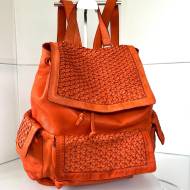 Ronald Rucksack aus gewaschenem Leder in Orange mit geflochtenen Klappen